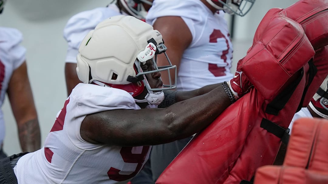 July 30, 2025; Tuscaloosa, AL, USA; defensive lineman Jeremiah Beaman hits the sled during the first practice session of the preseason for the Alabama Crimson Tide.