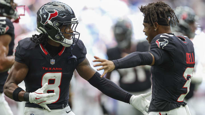 Aug 17, 2024; Houston, Texas, USA; Houston Texans wide receiver John Metchie III (8) and wide receiver Tank Dell (3) celebrate during the game against the New York Giants at NRG Stadium. Mandatory Credit: Troy Taormina-USA TODAY Sports