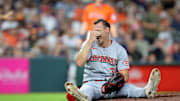 May 9, 2025; Houston, Texas, USA; Cincinnati Reds pitcher Brent Suter (31) sits on the mound after sustaining a slight injury against the Houston Astros during the eighth inning at Daikin Park. Mandatory Credit: Erik Williams-Imagn Images