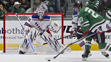Dec 20, 2024; Dallas, Texas, USA; New York Rangers goaltender Igor Shesterkin (31) faces a shot by Dallas Stars left wing Mason Marchment (27) during the third period at the American Airlines Center. Mandatory Credit: Jerome Miron-Imagn Images
