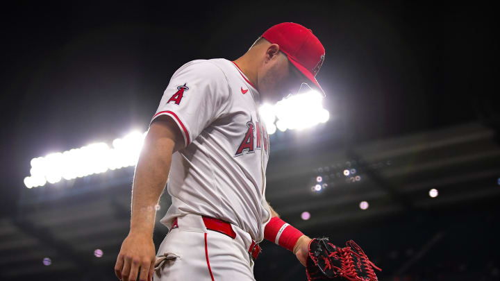 Apr 23, 2024; Anaheim, California, USA; Los Angeles Angels center fielder Mike Trout (27) returns to the dugout following the sixth inning against the Baltimore Orioles  at Angel Stadium. Mandatory Credit: Gary A. Vasquez-USA TODAY Sports