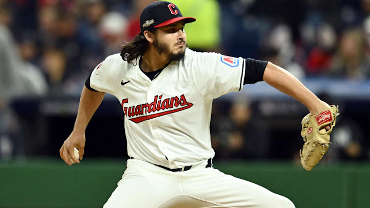 Oct 18, 2024; Cleveland, Ohio, USA; Cleveland Guardians pitcher Eli Morgan (49) pitches against the New York Yankees in the fifth inning during game four of the ALCS for the 2024 MLB playoffs at Progressive Field.