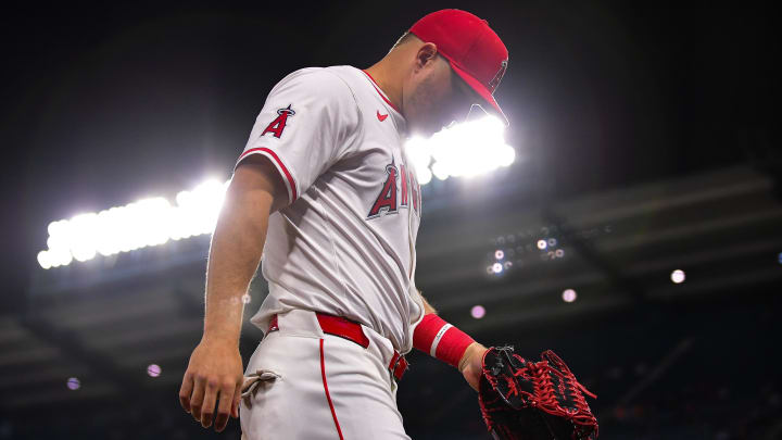 Apr 23, 2024; Anaheim, California, USA; Los Angeles Angels center fielder Mike Trout (27) returns to the dugout following the sixth inning against the Baltimore Orioles  at Angel Stadium. Mandatory Credit: Gary A. Vasquez-USA TODAY Sports