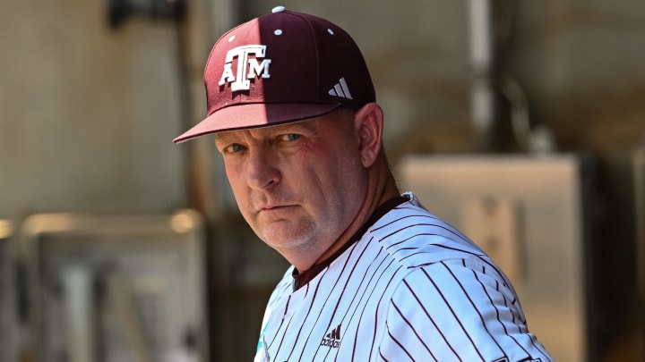 Jun 8, 2024; College Station, TX, USA; Texas A&M head coach Jim Schlossnagle looks on from the dugout prior to the game against the Oregon at Olsen Field, Blue Bell Park.