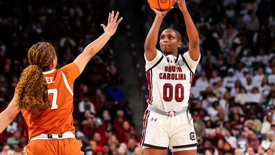 South Carolina Gamecocks guard Ta'niya Latson (00) shoots over Texas Longhorns guard Jordan Lee