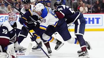 Mar 29, 2025; Denver, Colorado, USA; St. Louis Blues left wing Pavel Buchnevich (89) scores on Colorado Avalanche goaltender Mackenzie Blackwood (39) as Colorado Avalanche center Martin Necas (88) and defenseman Ryan Lindgren (55) defend in the third period at Ball Arena. Mandatory Credit: Ron Chenoy-Imagn Images