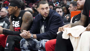 Apr 5, 2024; Chicago, Illinois, USA; Chicago Bulls guard Zach LaVine (8) sits on the bench in street clothes during the first quarter at United Center. Mandatory Credit: David Banks-USA TODAY Sports