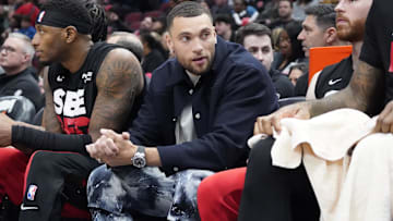 Apr 5, 2024; Chicago, Illinois, USA; Chicago Bulls guard Zach LaVine (8) sits on the bench in street clothes during the first quarter at United Center. Mandatory Credit: David Banks-Imagn Images