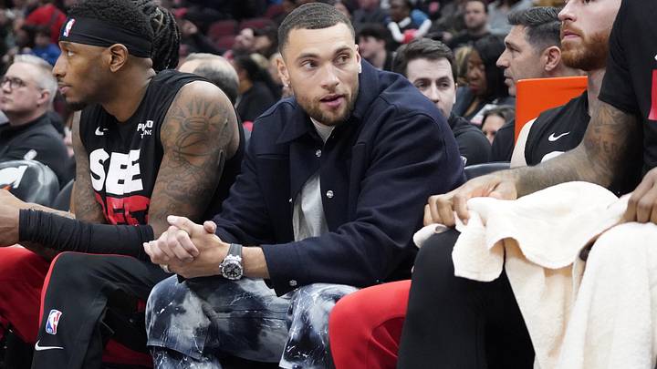 Apr 5, 2024; Chicago, Illinois, USA; Chicago Bulls guard Zach LaVine (8) sits on the bench in street clothes during the first quarter at United Center. Mandatory Credit: David Banks-Imagn Images