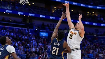 Nikola Jokic shoots the ball