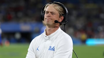Sep 12, 2025; Pasadena, California, USA;  UCLA Bruins assistant head coach Jerry Neuheisel looks on during the second half against the New Mexico Lobos at Rose Bowl. Mandatory Credit: Kiyoshi Mio-Imagn Images