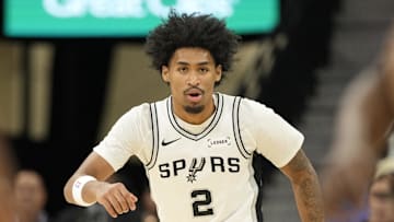 Oct 30, 2025; San Antonio, Texas, USA; San Antonio Spurs guard Dylan Harper (2) gets back on defense during the first half against the Miami Heat at Frost Bank Center. Mandatory Credit: Scott Wachter-Imagn Images