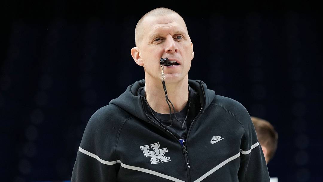 Kentucky Wildcats head coach Mark Pope walks onto the court Thursday, March 27, 2025, during practice ahead of the Sweet 16 March Madness tournament game against the Tennessee Volunteers at Lucas Oil Stadium in Indianapolis. Kentucky Wildcats head coach Mark Pope walks onto the court Thursday, March 27, 2025, during practice ahead of the Sweet 16 March Madness tournament game against the Tennessee Volunteers at Lucas Oil Stadium in Indianapolis.
