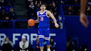 Mar 4, 2025; Colorado Springs, Colorado, USA; Boise State Broncos guard Alvaro Cardenas (11) dribbles the ball up court in the first half against the Air Force Falcons at Clune Arena. Mandatory Credit: Isaiah J. Downing-Imagn Images