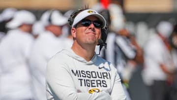 Sep 13, 2025; Columbia, Missouri, USA; Missouri Tigers head coach Eli Drinkwitz watches a replay against the Louisiana-Lafayette Ragin Cajuns during the second half of the game at Faurot Field at Memorial Stadium. Mandatory Credit: Denny Medley-Imagn Images