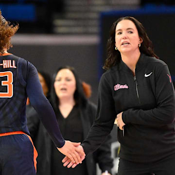 Feb 20, 2025; Los Angeles, California, USA; Illinois Fighting Illini head coach Shauna Green and Illinois Fighting Illini forward Brynn Shoup-Hill (23) during the second quarter against the UCLA Bruins at Pauley Pavilion presented by Wescom. Mandatory Credit: Robert Hanashiro-Imagn Images