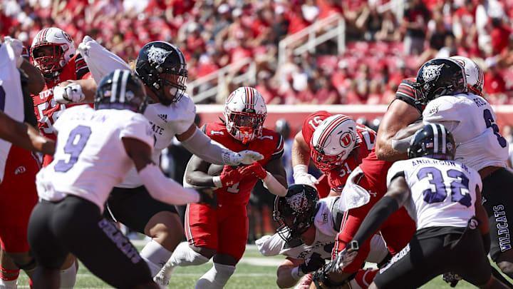 Sep 16, 2023; Salt Lake City, Utah, USA; Utah Utes running back Jaylon Glover (1) runs the ball against the Weber State Wildcats in the first half at Rice-Eccles Stadium. Mandatory Credit: Rob Gray-Imagn Images
