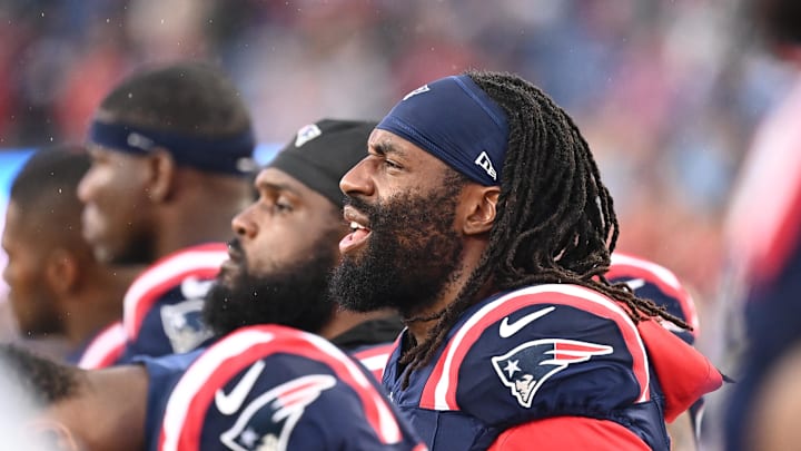 August 8, 2024; Foxborough, MA, USA;  New England Patriots linebacker Matthew Judon (9) on the sideline during the first half against the Carolina Panthers at Gillette Stadium. Mandatory Credit: Eric Canha-USA TODAY Sports