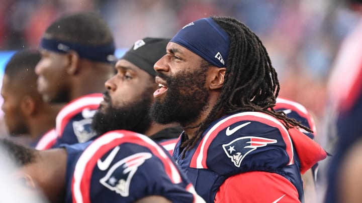 August 8, 2024; Foxborough, MA, USA;  New England Patriots linebacker Matthew Judon (9) on the sideline during the first half against the Carolina Panthers at Gillette Stadium. Mandatory Credit: Eric Canha-USA TODAY Sports