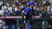 Sep 25, 2025; Seattle, Washington, USA; Seattle Mariners third baseman Eugenio Suarez (28) hits an RBI-single against the Colorado Rockies during the fifth inning at T-Mobile Park.