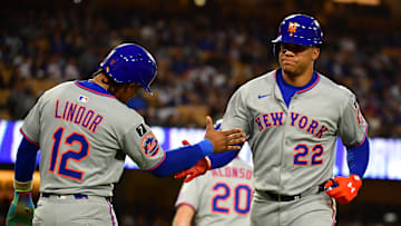 Jun 3, 2025; Los Angeles, California, USA; New York Mets outfielder Juan Soto (22) reacts with shortstop Francisco Lindor (12) after hitting a two run home run against the Los Angeles Dodgers during the third inning at Dodger Stadium. Mandatory Credit: Gary A. Vasquez-Imagn Images