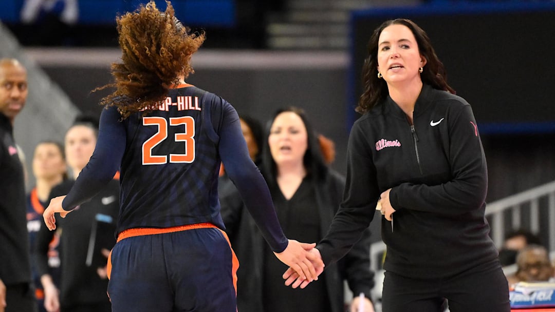 Feb 20, 2025; Los Angeles, California, USA; Illinois Fighting Illini head coach Shauna Green and Illinois Fighting Illini forward Brynn Shoup-Hill (23) during the second quarter against the UCLA Bruins at Pauley Pavilion presented by Wescom. Mandatory Credit: Robert Hanashiro-Imagn Images