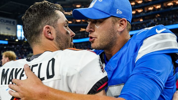 Tampa Bay Buccaneers quarterback Baker Mayfield (6) hugs Detroit Lions quarterback Jared Goff (16) 