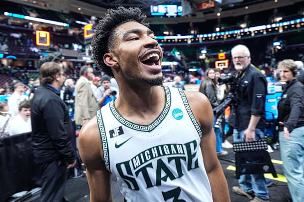 Michigan State guard Jaden Akins (3) celebrates 71-63 win over New Mexico at the Second Round of NCAA tournament.
