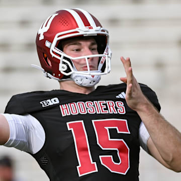 Indiana’s Fernando Mendoza (15) throws a pass during spring practice at Memorial Stadium on Thursday, April 3, 2025.
