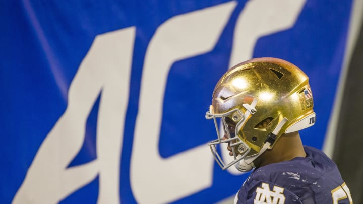 Dec. 19, 2020; Charlotte, NC, USA; Notre Dame's Jayson Ademilola (57) heads to the locker room following the ACC Championship football game on Saturday, Dec. 19, 2020, inside Bank of America Stadium in Charlotte, NC. Clemson won 34-10.  Credit: Robert Franklin