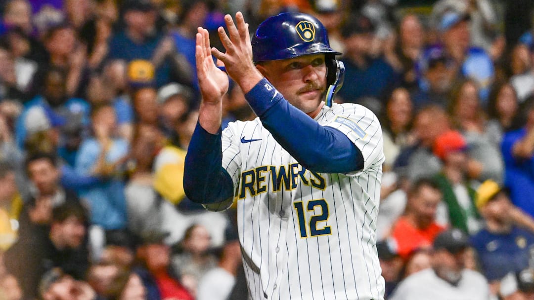 Sep 28, 2024: Milwaukee Brewers first baseman Rhys Hoskins (12) reacts after scoring a run in the fourth inning against the New York Mets at American Family Field. 