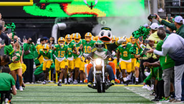Oct 21, 2023; Eugene, Oregon, USA; Oregon Ducks mascot The Duck leads the team entrance against the Washington State Cougars at Autzen Stadium. Mandatory Credit: Craig Strobeck-USA TODAY Sports