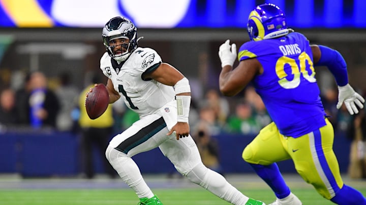 Eagles quarterback Jalen Hurts (left) takes on the Rams in what could be a low-scoring game.