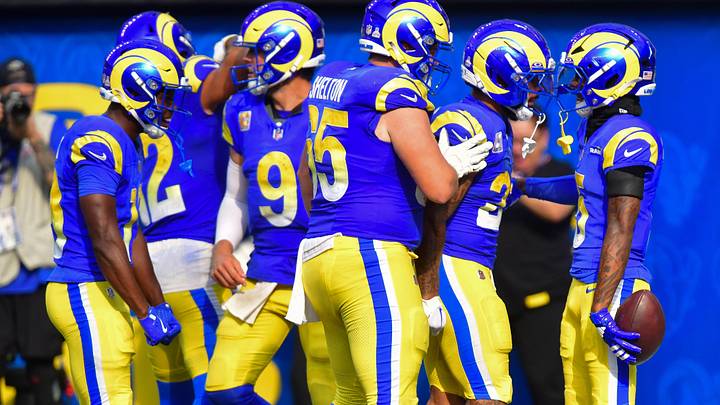 Los Angeles Rams offense celebrates a touchdown. Mandatory Credit: Gary A. Vasquez-Imagn Images
