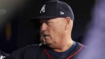Atlanta Braves manager Brian Snitker stands in the dugout after the sixth inning against the Toronto Blue Jays at Rogers Centre.