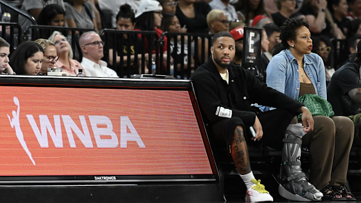 Damian Lillard courtside at a WNBA game. Damian Lillard courtside at a WNBA game.