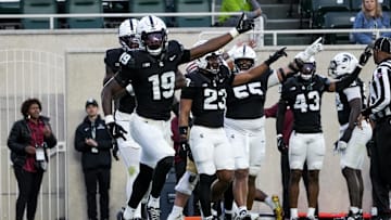 Sep 6, 2025; East Lansing, Michigan, USA; Michigan State defensive back Armorion Smith (19) celebrates a fumble recovery in the first quarter at Spartan Stadium. Mandatory Credit: Brendan Mullin-Imagn Images