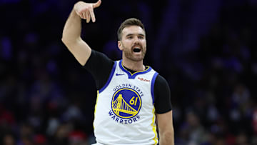 Golden State Warriors guard Pat Spencer (61) reacts to his three pointer against the Philadelphia 76ers during the fourth quarter at Xfinity Mobile Arena.