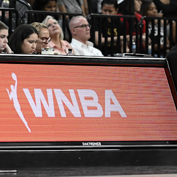 May 30, 2025; Las Vegas, Nevada, USA; NBA player Damian Lillard sits courtside during the Las Vegas Aces and Los Angeles Sparks game at Michelob Ultra Arena. Mandatory Credit: Candice Ward-Imagn Images