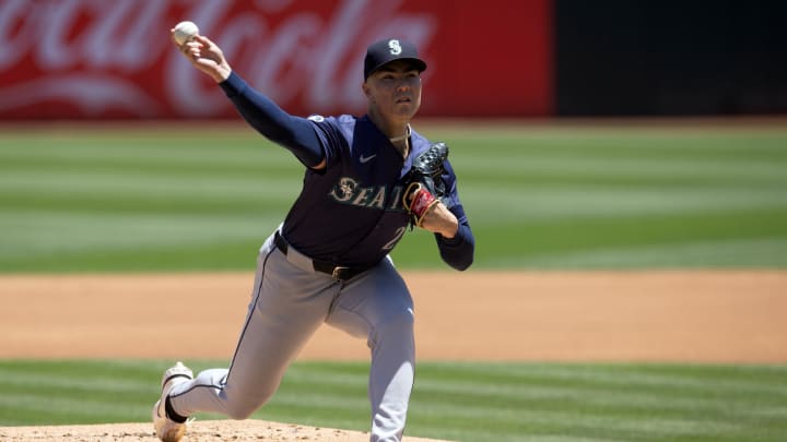 Seattle Mariners starting pitcher Bryan Woo throws against the Oakland Athletics in June at Oakland-Alameda County Coliseum.