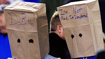 Oct 26, 2024; Lexington, Kentucky, USA; Kentucky Wildcats fans wear paper bags on their heads during the third quarter against the Auburn Tigers at Kroger Field. Mandatory Credit: Jordan Prather-Imagn Images