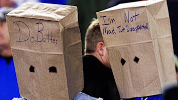 Oct 26, 2024; Lexington, Kentucky, USA; Kentucky Wildcats fans wear paper bags on their heads during the third quarter against the Auburn Tigers at Kroger Field. Mandatory Credit: Jordan Prather-Imagn Images
