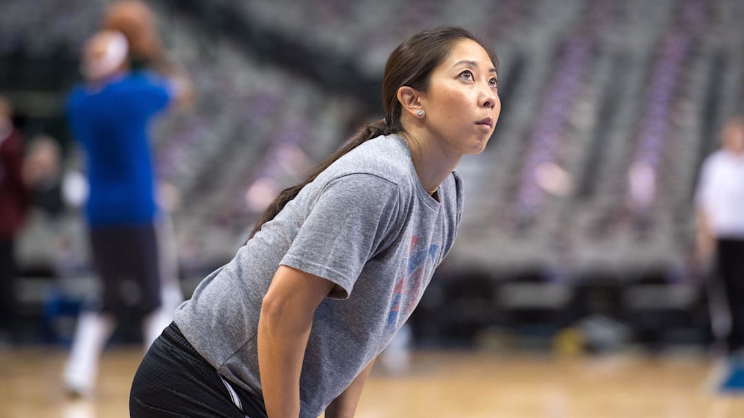 Mar 13, 2015; Dallas, TX, USA; Los Angeles Clippers assistant video coordinator Natalie Nakase helps warm up the Clippers before the game against the Dallas Mavericks at the American Airlines Center. Mandatory Credit: Jerome Miron-Imagn Images