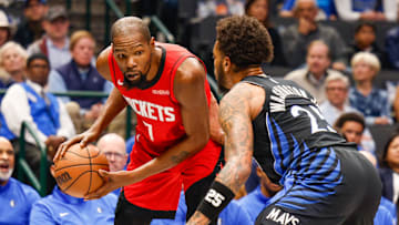 Dec 6, 2025; Dallas, Texas, USA; Houston Rockets forward Kevin Durant (7) is guarded by Dallas Mavericks forward P.J. Washington (25) during the first quarter at American Airlines Center. Mandatory Credit: Andrew Dieb-Imagn Images