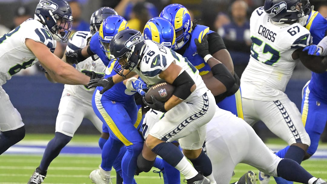 Jan 5, 2025; Inglewood, California, USA; Seattle Seahawks running back Zach Charbonnet (26) carries the ball in the second half against the Los Angeles Rams at SoFi Stadium. Mandatory Credit: Jayne Kamin-Oncea-Imagn Images Jan 5, 2025; Inglewood, California, USA; Seattle Seahawks running back Zach Charbonnet (26) carries the ball in the second half against the Los Angeles Rams at SoFi Stadium. Mandatory Credit: Jayne Kamin-Oncea-Imagn Images