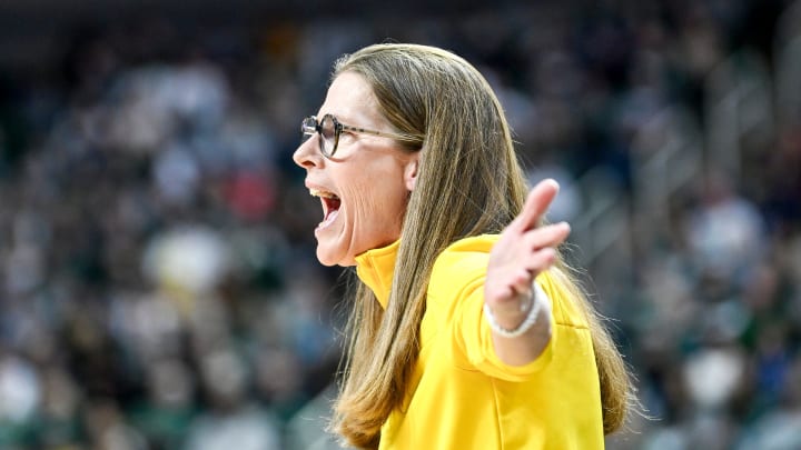 Michigan's head coach Kim Barnes Arico calls out to players during the first quarter in the game against Michigan State on Saturday, Jan. 27, 2024, at the Breslin Center in East Lansing.