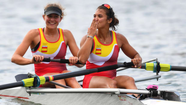 Rower blows a kiss after race.