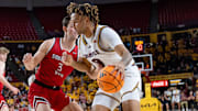 Arizona State Sun Devils Marcus Adams Jr. (8) runs with the ball against Southern Utah Thunderbirds Tanner Hayhurst (3) during a game at Desert Financial Arena in Tempe on Nov. 4, 2025.