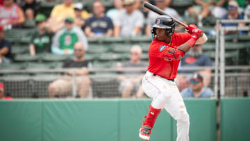 Eddinson Paulino bats as a member of the Boston Red Sox system during the Spring Breakout game against the Atlanta Braves at JetBlue Park on March 16.