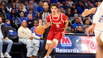 Feb 9, 2025; Memphis, Tennessee, USA; Temple Owls forward Steve Settle III (2) drives to the basket against the Memphis Tigers during the second half at FedExForum. Mandatory Credit: Wesley Hale-Imagn Images